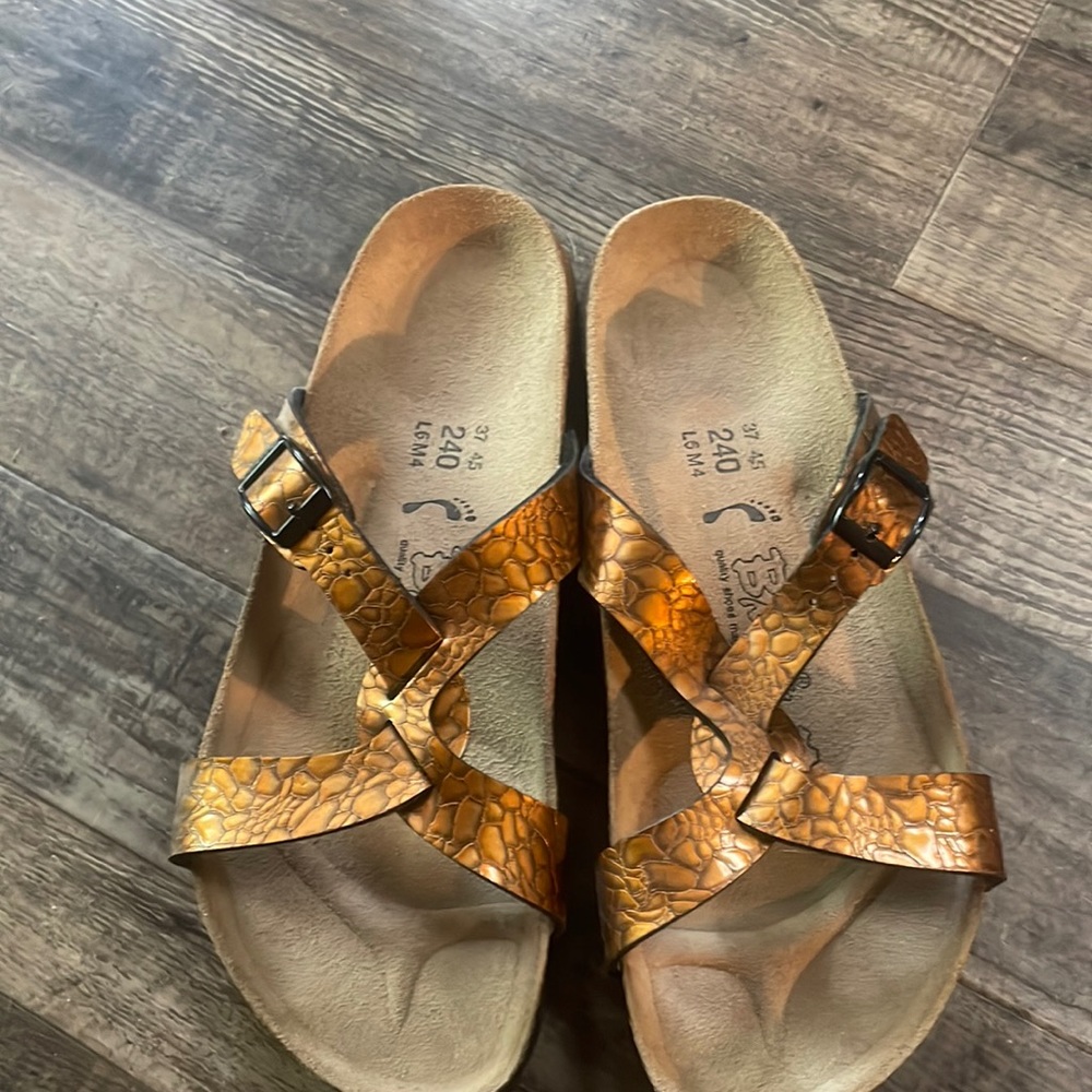 Birkenstocks/ orange snake skin brand new size 7